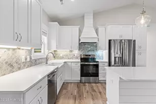 310 NE 58th St, Oak Island, NC 28465 - Photo 10