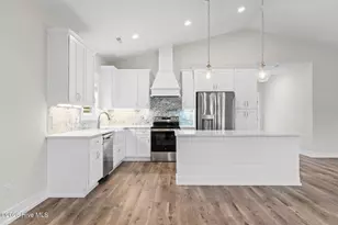 310 NE 58th St, Oak Island, NC 28465 - Photo 12