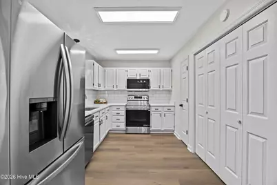 322 NE 57th Street, Oak Island, NC 28465 - Photo 14