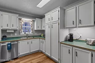 212 NE 33rd St, Oak Island, NC 28465 - Photo 14
