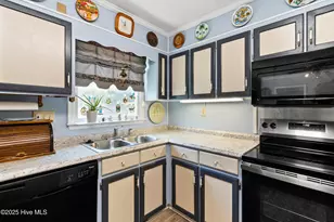 210 NE 52nd St, Oak Island, NC 28465 - Photo 14