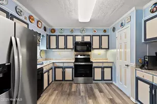 210 NE 52nd St, Oak Island, NC 28465 - Photo 16