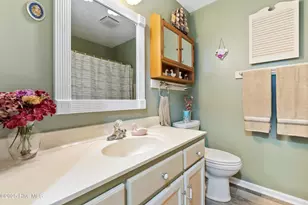 210 NE 52nd St, Oak Island, NC 28465 - Photo 26