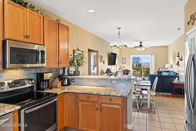 916 E Dolphin Drive, Oak Island, NC 28465 - Photo 16