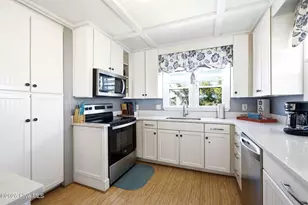 2915 E Beach Dr, Oak Island, NC 28465 - Photo 14