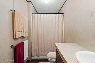 211 NE 76th St, Oak Island, NC 28465 - Photo 26