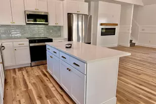 106 NW 23rd St, Oak Island, NC 28465 - Photo 6