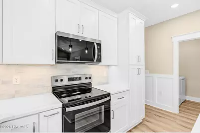 225 NE 75th Street, Oak Island, NC 28465 - Photo 12