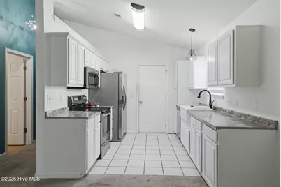 7404 Huckleberry Lane SW, Sunset Beach, NC 28468 - Photo 12