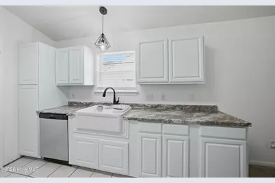 7404 Huckleberry Lane SW, Sunset Beach, NC 28468 - Photo 14