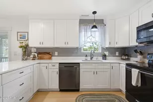 101 NW 11th St, Oak Island, NC 28465 - Photo 16