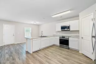 73 Shamrock Dr SW, Sunset Beach, NC 28468 - Photo 10