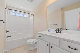 329 NE 59th St, Oak Island, NC 28465 - Photo 24