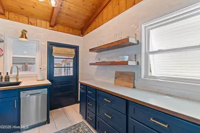 318 NE 58th Street, Oak Island, NC 28465 - Photo 18