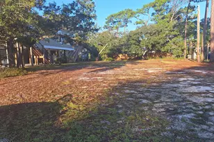 209 NE 69th St, Oak Island, NC 28465 - Photo 1