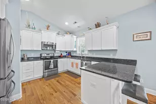 128 NE 8th St, Oak Island, NC 28465 - Photo 14