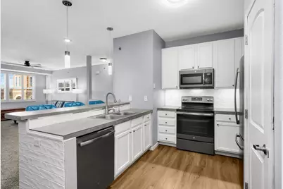 10075 City Walk Drive #205, Woodbury, MN 55129 - Photo 1