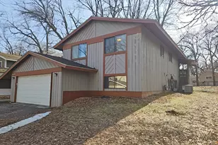 10810 Linwood Forest Dr, Champlin, MN 55316 - Photo 1