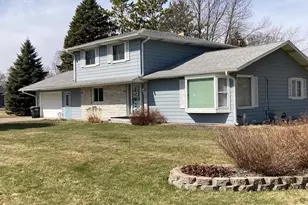 693 Stearns Ave E, Eden Valley, MN 55329 - Photo 1