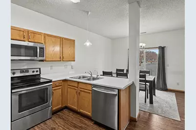 665 Kingfisher Lane #E, Woodbury, MN 55125 - Photo 6