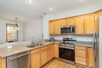 11023 Oak Grove Circle #E, Woodbury, MN 55129 - Photo 8