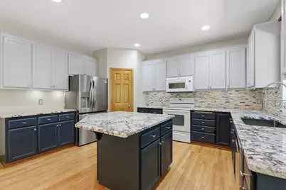9142 Woodland Drive, Saint Bonifacius, MN 55375 - Photo 12