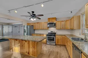 220 Cedar Ave S, Watkins, MN 55389 - Photo 1