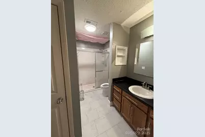 9037 J M Keynes Drive #Unit 28, Charlotte, NC 28262 - Photo 8