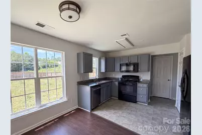 7115 Wandering Creek Drive, Charlotte, NC 28216 - Photo 4