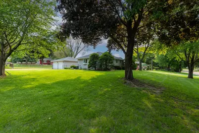 6943 Upper 5th Street N, Oakdale, MN 55128 - Photo 1