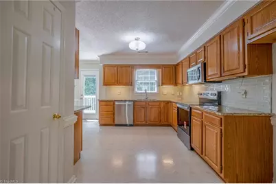 5519 Pebble Garden Court, Greensboro, NC 27407 - Photo 12