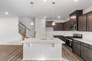 1022 Poets Walk Rd, Whitsett, NC 27377 - Photo 4