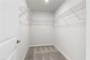 1022 Poets Walk Rd, Whitsett, NC 27377 - Photo 16