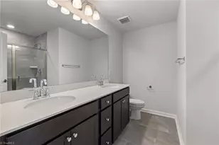1022 Poets Walk Rd, Whitsett, NC 27377 - Photo 14