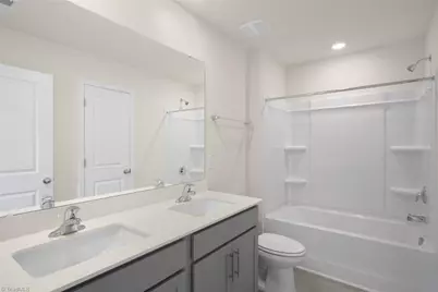 7153 Royal Ascot Drive, Whitsett, NC 27377 - Photo 24