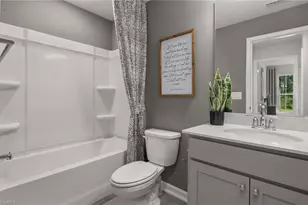 1024 Poets Walk Rd, Whitsett, NC 27377 - Photo 16