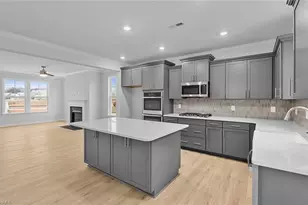 8605 Lemur Ln, Summerfield, NC 27358 - Photo 12