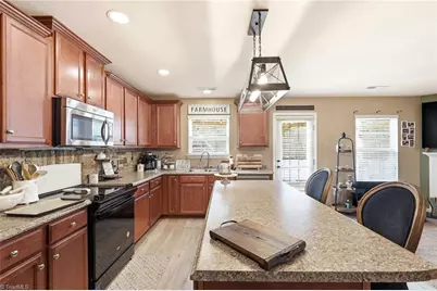 730 Traveller Drive, Whitsett, NC 27377 - Photo 14