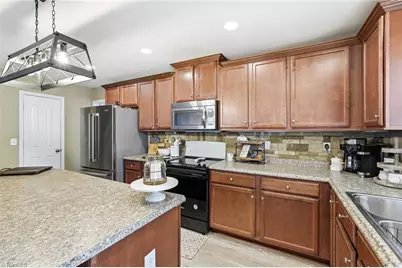 730 Traveller Drive, Whitsett, NC 27377 - Photo 18