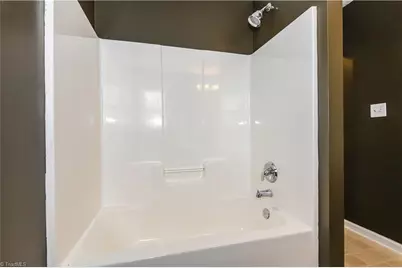 1127 Oak Blossom Way, Whitsett, NC 27377 - Photo 16