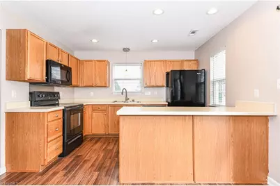 1127 Oak Blossom Way, Whitsett, NC 27377 - Photo 6