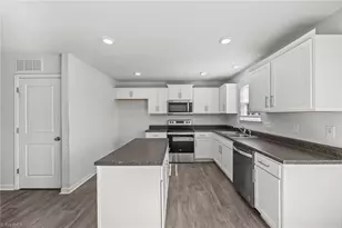 6884 Keeneland Dr, Whitsett, NC 27377 - Photo 12