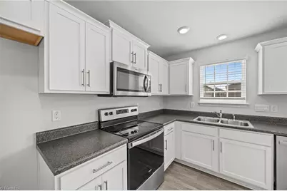 6884 Keeneland Drive, Whitsett, NC 27377 - Photo 14