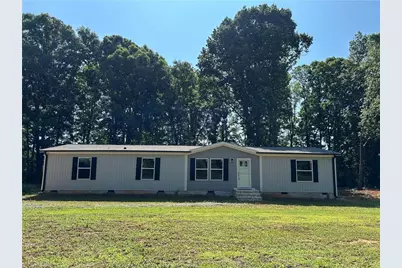 6008 Apple Wyrick Road, Gibsonville, NC 27249 - Photo 1