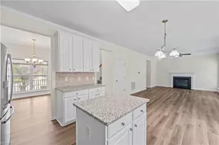 693 Triple Crown Ct, Whitsett, NC 27377 - Photo 8
