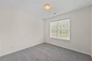 693 Triple Crown Ct, Whitsett, NC 27377 - Photo 24