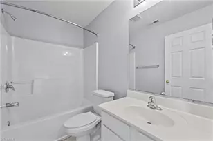 693 Triple Crown Ct, Whitsett, NC 27377 - Photo 26