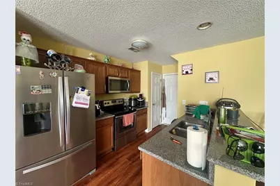 7728 Oliver Park Drive, Whitsett, NC 27377 - Photo 6