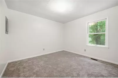 8474 Running Creek Road, Gibsonville, NC 27249 - Photo 16