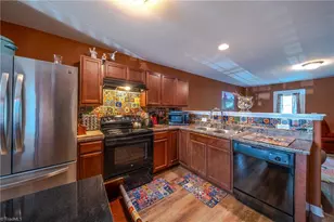 1166 Brooksridge Way, Whitsett, NC 27377 - Photo 6